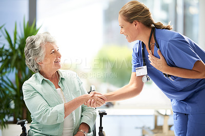 Buy stock photo Handshake, nurse and senior advice in wheelchair with medical results and surgery success news. Hospital, healthcare and clinic with women and nursing staff with care and support of elderly person