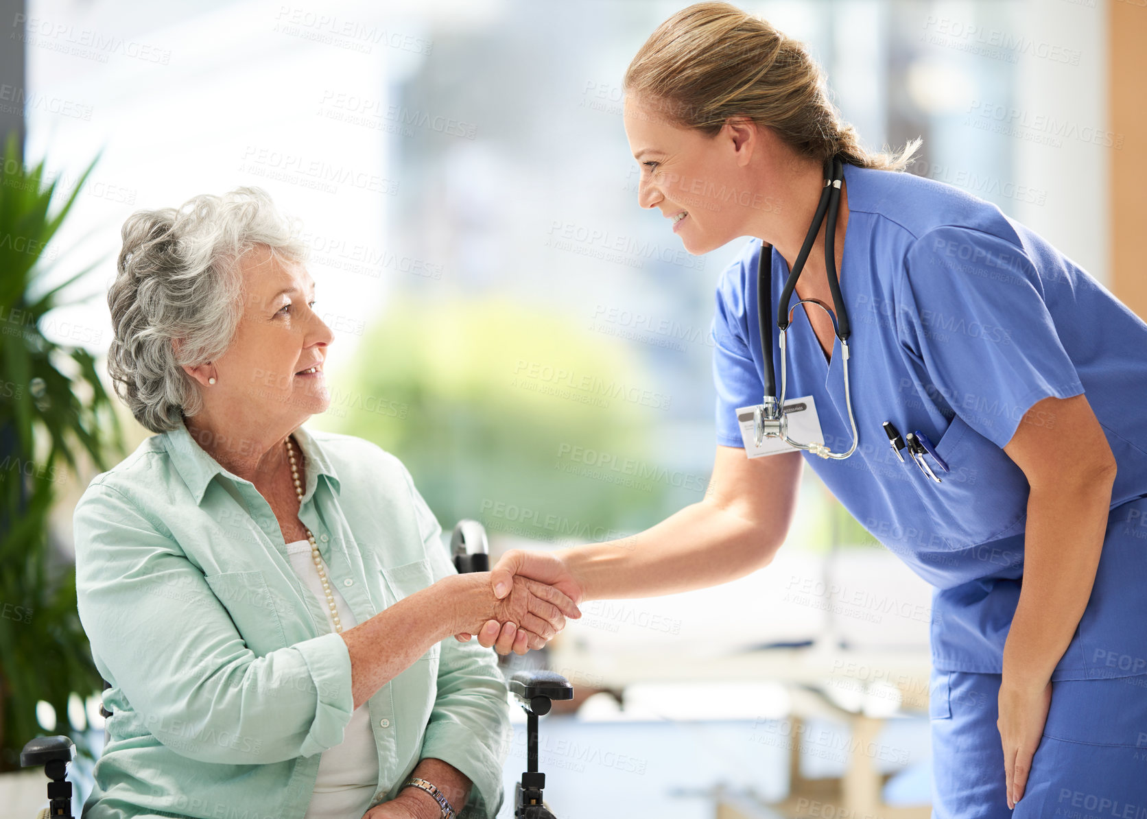 Buy stock photo Handshake, nurse and elderly woman in wheelchair with medical results and surgery success news. Hospital, healthcare and clinic with women and nursing staff with care and support of senior person