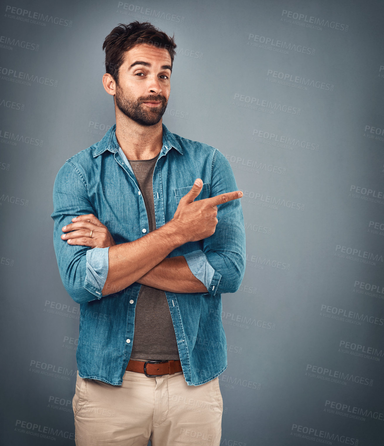 Buy stock photo Point, hands and portrait of man in studio on gray background for announcement, news and information. Fashion, mockup space and male person with pointing hand sign for promotion, choice and decision