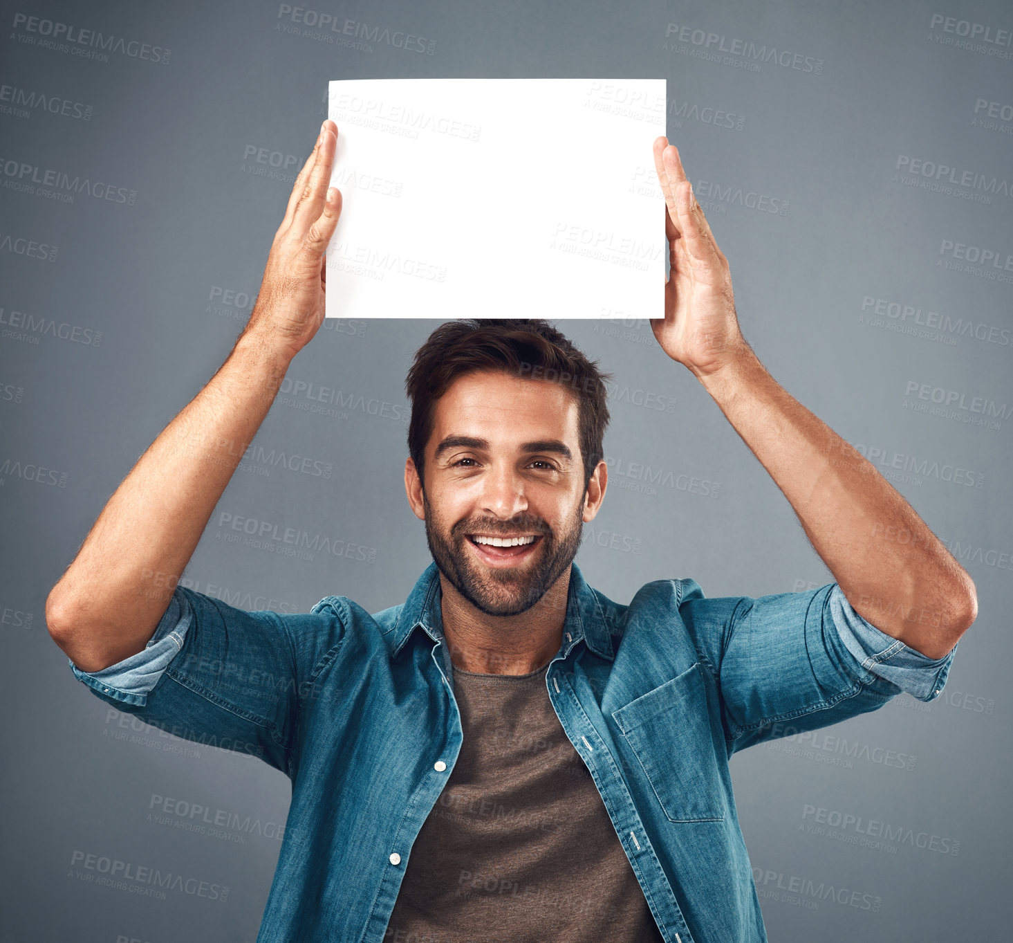 Buy stock photo Happy man, portrait and poster on mockup for advertising, marketing or branding against a grey studio background. Male person holding rectangle billboard or placard for sign, message or advertisement