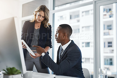 Buy stock photo Computer, tablet and manager with businessman in office for opinion, review or feedback on project. Help, technology and mentor with male financial planner for advice on revenue report for client.