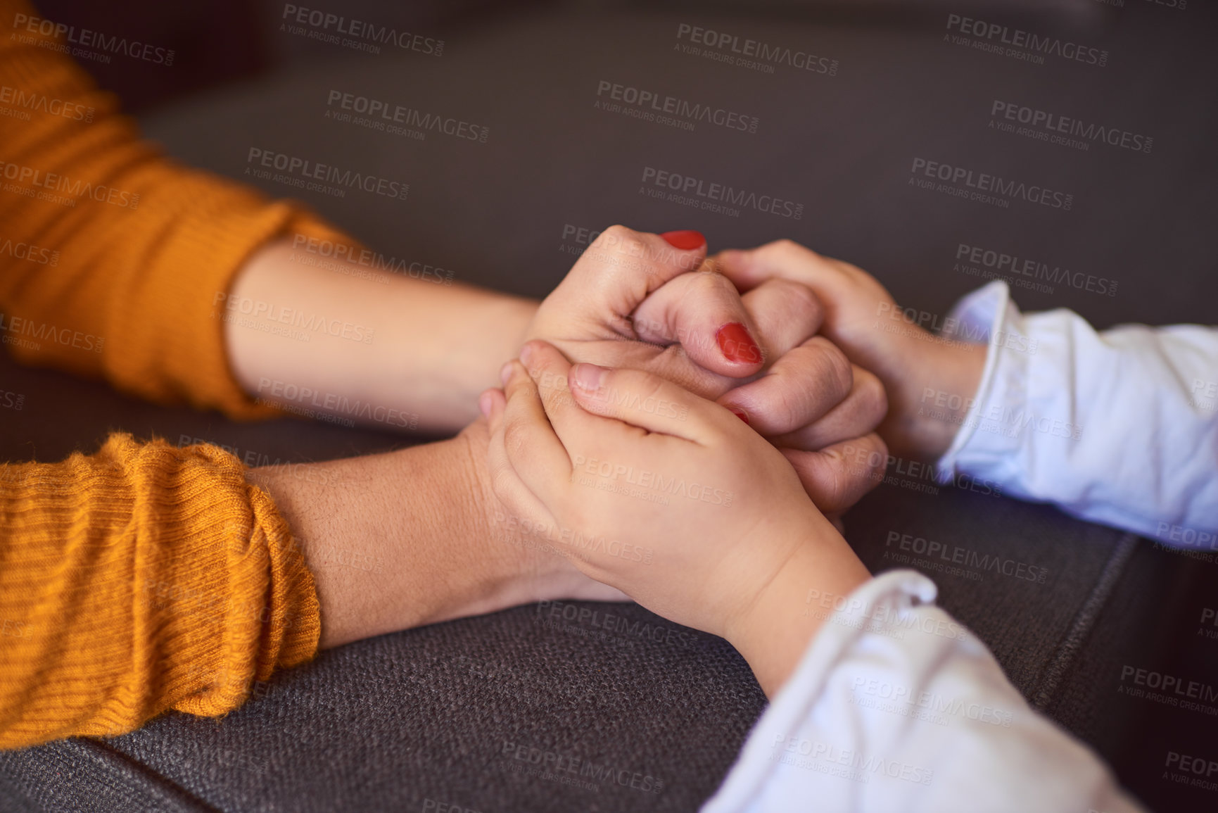 Buy stock photo Cropped shot of a little girl holding on to her mother's hands