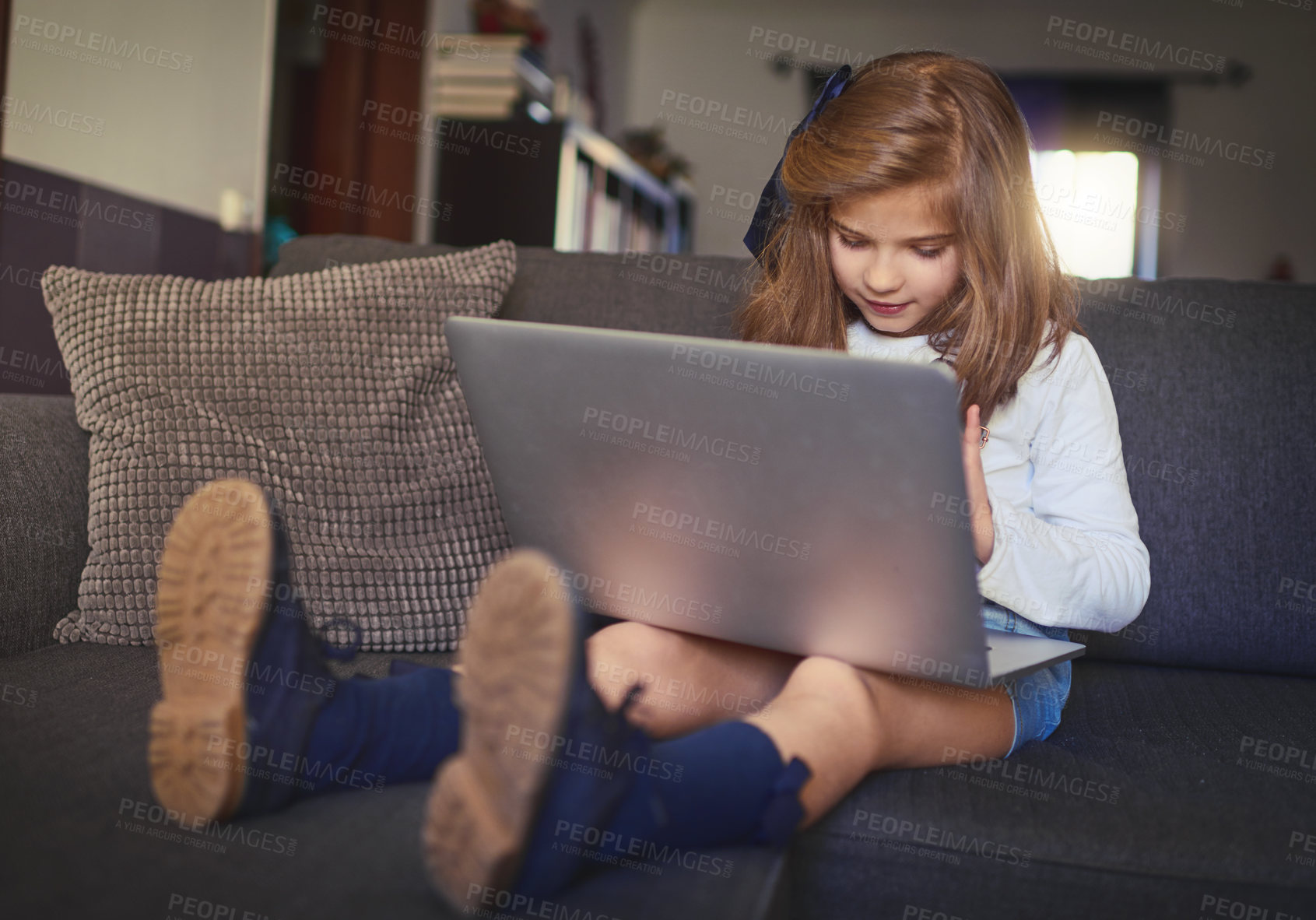 Buy stock photo Shot of adorable little kids using wireless technology at home