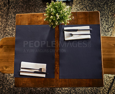 Buy stock photo Wooden table, cutlery and restaurant knife, fork and napkin for cafe, coffee shop or modern retail store. Hospitality service, commerce and top view of empty desk, diner setting and eating utensils