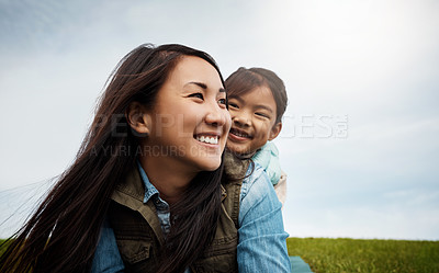 Buy stock photo Happy mom, kid and piggyback with freedom in nature for bonding, holiday or outdoor weekend. Asian mother carry girl, child or daughter with smile for adventure, embrace or childhood at park outside