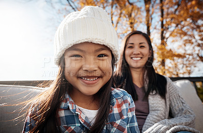 Buy stock photo Portrait of an adorable little girl enjoying an autumn day outdoors