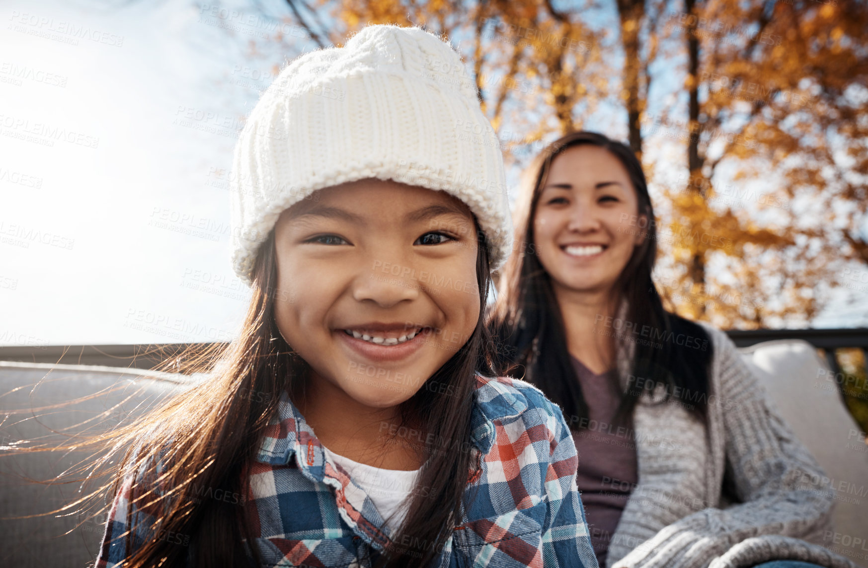 Buy stock photo Portrait of an adorable little girl enjoying an autumn day outdoors