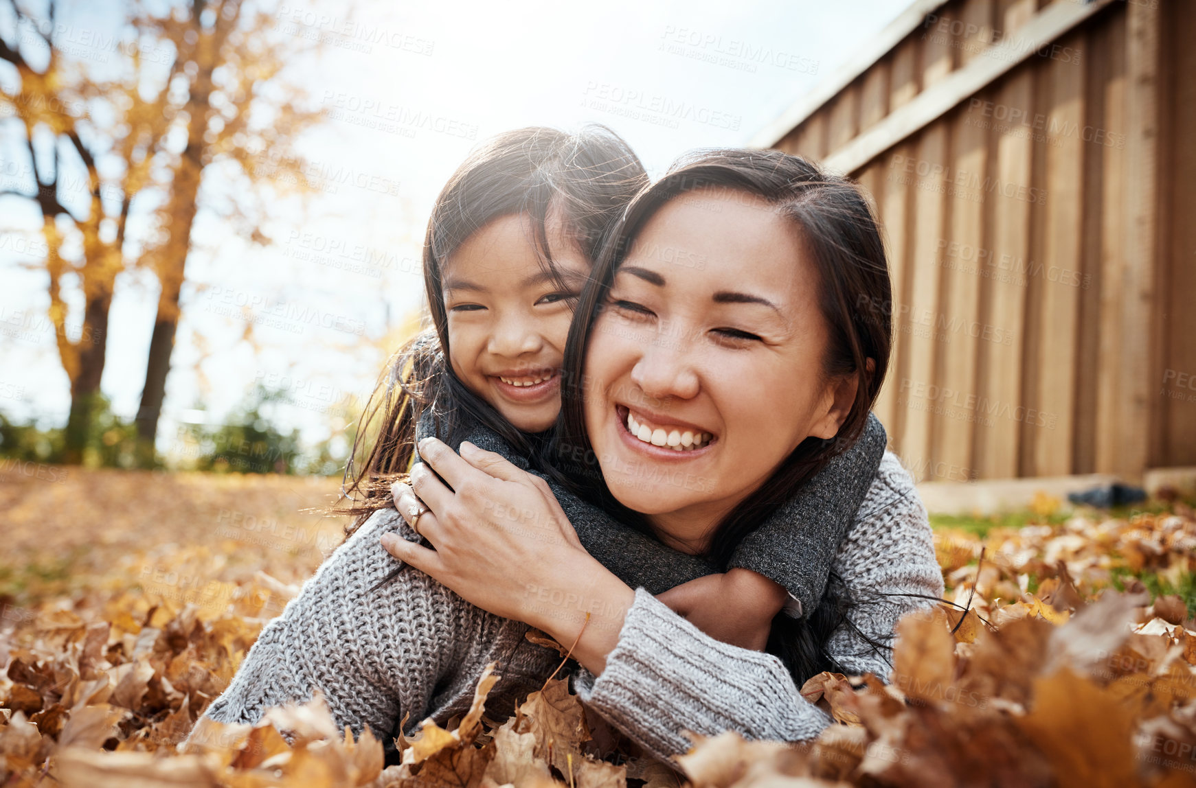 Buy stock photo Portrait of an adorable little girl enjoying an autumn day outdoors