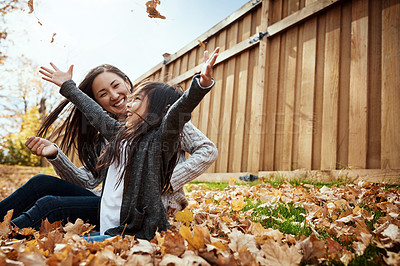 Buy stock photo Shot of an adorable little girl enjoying an autumn day outdoors