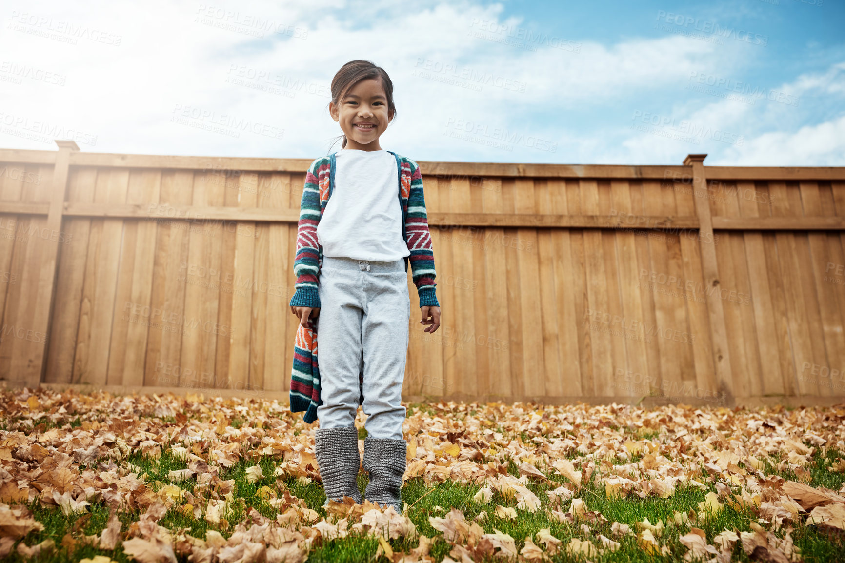 Buy stock photo Portrait of an adorable little girl enjoying an autumn day outdoors