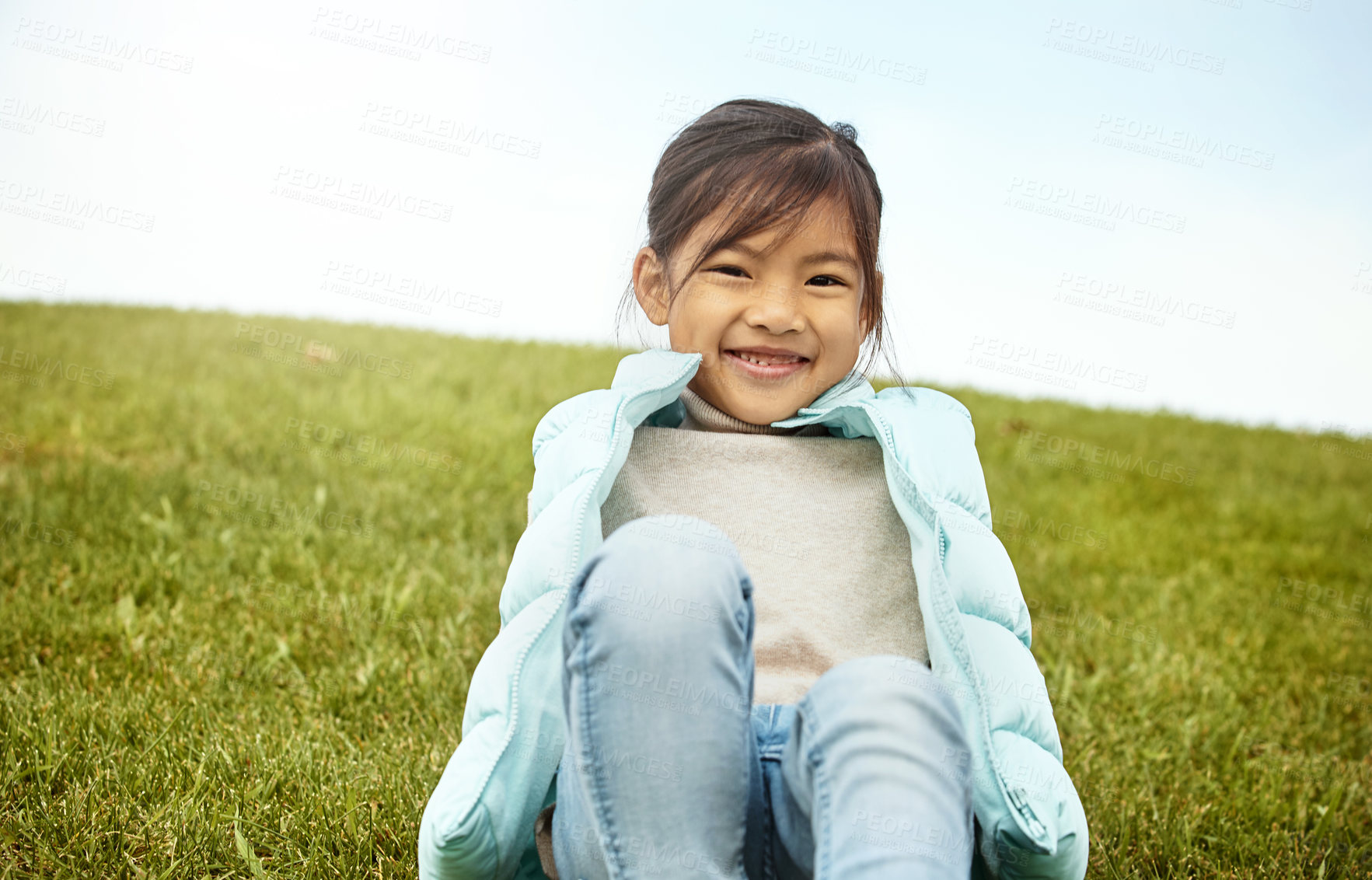 Buy stock photo Shot of an adorable little girl spending the day outdoors