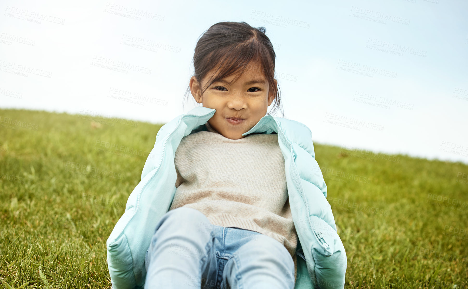 Buy stock photo Shot of an adorable little girl spending the day outdoors 