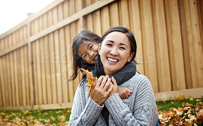Buy stock photo Portrait of an adorable little girl enjoying an autumn day outdoors