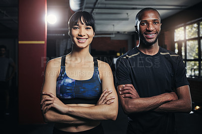 Buy stock photo Portrait of two young people at the gym for a workout