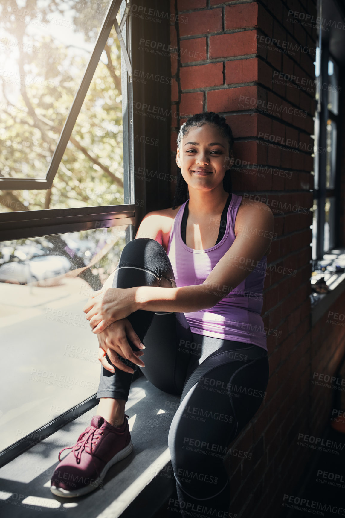 Buy stock photo Portrait of a beautiful young woman sitting at the gym