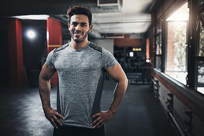 Buy stock photo Portrait of a handsome young man at the gym for a workout