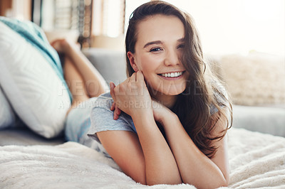 Buy stock photo Portrait of an attractive young woman spending a relaxing day on her bed at home