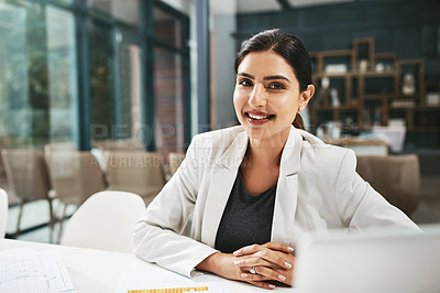 Buy stock photo Portrait of a young businesswoman working in an office