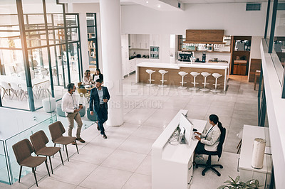 Buy stock photo High angle shot of businesspeople in an office