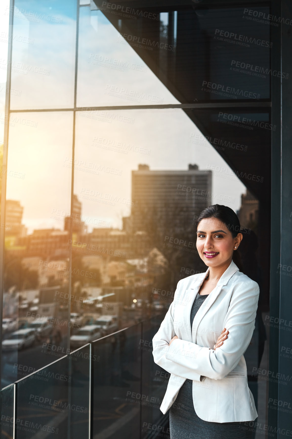 Buy stock photo Portrait of a young businesswoman standing on the office balcony
