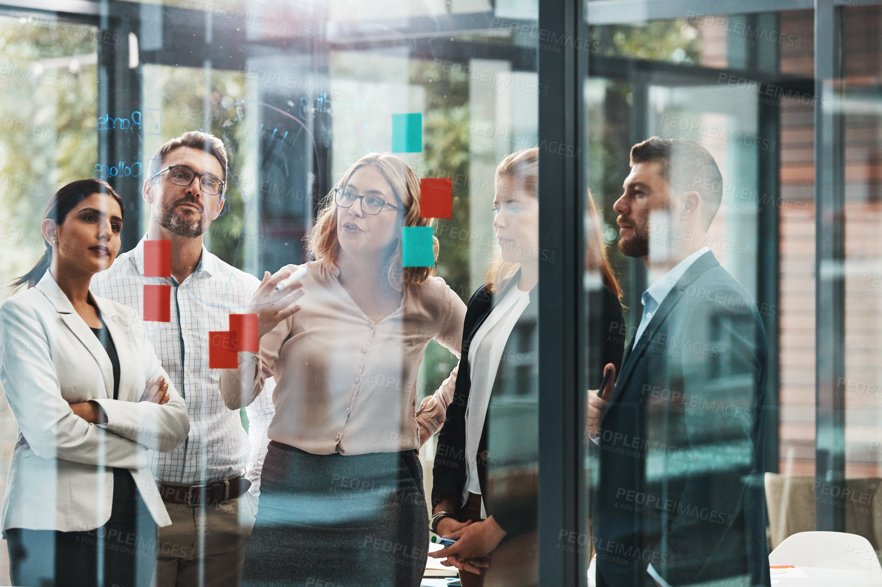 Buy stock photo Woman, group and discussion with notes on board with review, listening and planning with brainstorming. Coach, training and team by glass wall, questions and collaboration with strategy in office