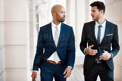 Buy stock photo Cropped shot of young handsome businessmen talking outside