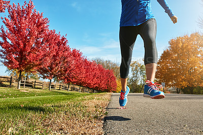 Buy stock photo Closeup shot of an unrecognizable woman running outdoors