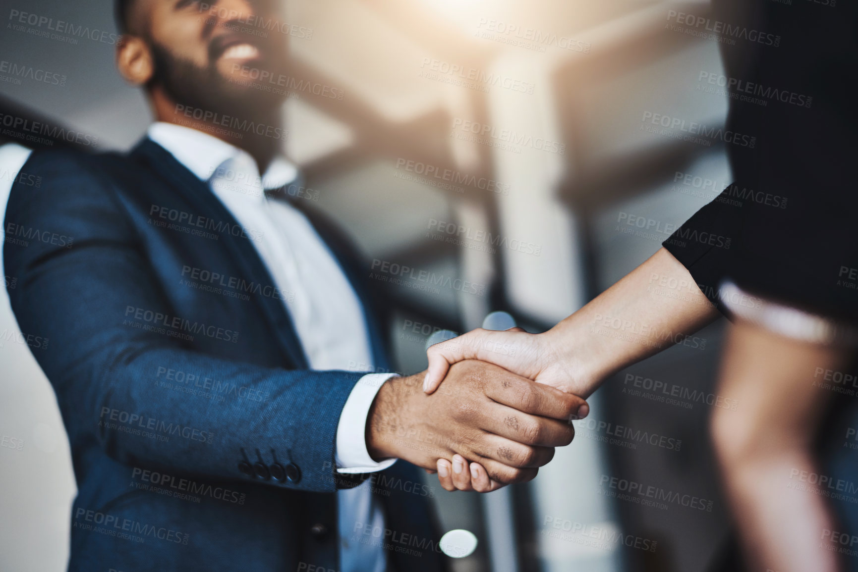 Buy stock photo Hand shake, man and woman with low angle in office for welcome, b2b agreement and onboarding with smile. Businessman, partnership and kindness in human resources, hiring or team building in workplace