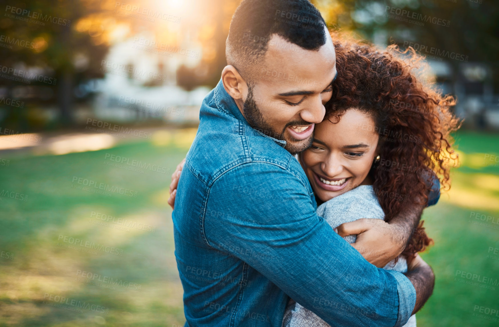 Buy stock photo Love, hug and couple in park, trust and romance with relationship, marriage and bonding together. Outdoor, embrace and happy man with woman, peaceful and support with adventure, smile and kindness