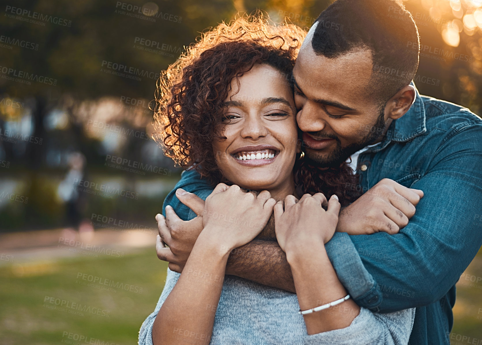 Buy stock photo Love, hug and couple in park, smile and joy with romance, bonding and relationship with happiness. Portrait, partners or man with woman, embrace, outside or marriage with wellness, loving or carefree
