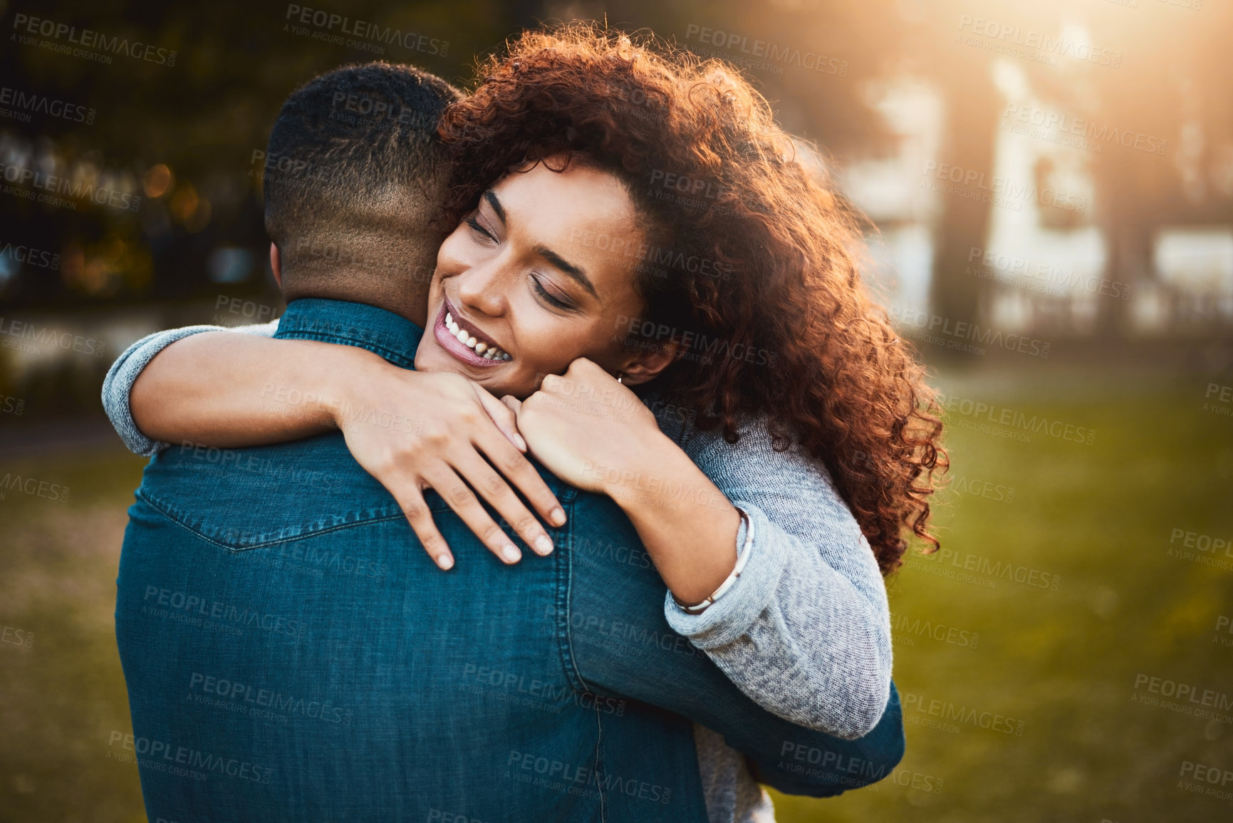 Buy stock photo Love, hug and couple in park, care and romance with relationship, marriage and bonding together. Outdoor, embrace or happy man with woman, trust or support with adventure, smile or kindness with date