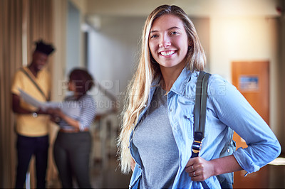 Buy stock photo Portrait of a university student standing in a corridor at campus