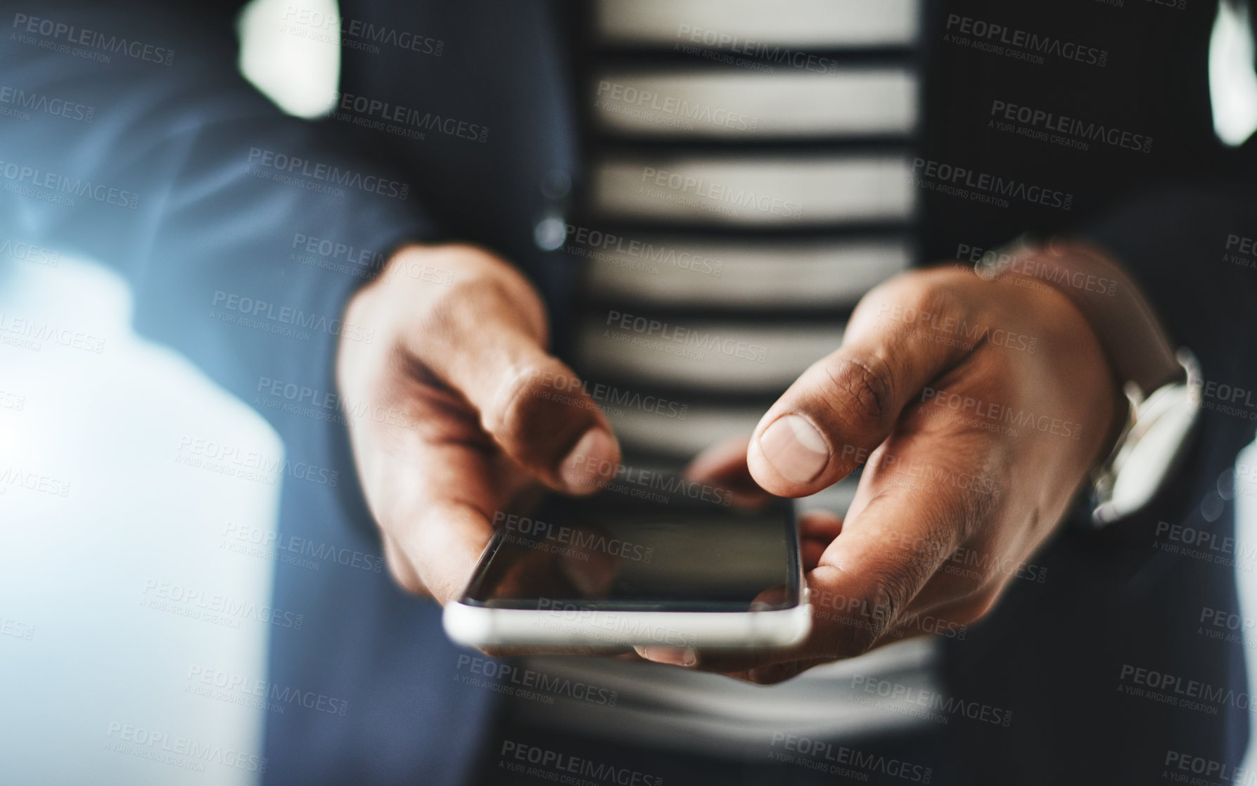 Buy stock photo Hands of business man typing on phone, networking on social media and browsing internet at work. Closeup of a professional corporate employee checking a text, scrolling an app and reading message