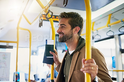 Buy stock photo Cropped shot of a handsome young man on his morning bus commute