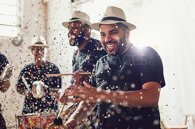 Buy stock photo Shot of a group of musical performers playing drums together