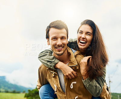 Buy stock photo Laugh, love and piggyback with portrait of couple in nature for happy, smile and bonding. Happiness, relax and care with man carrying woman on countryside date for spring, vacation and support 