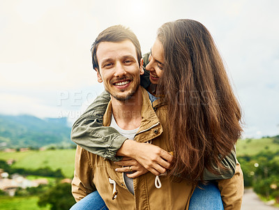 Buy stock photo Relax, love and piggyback with couple in nature for happy, smile and bonding. Happiness, playful and care with portrait of man carrying woman on countryside date for spring, vacation and support 