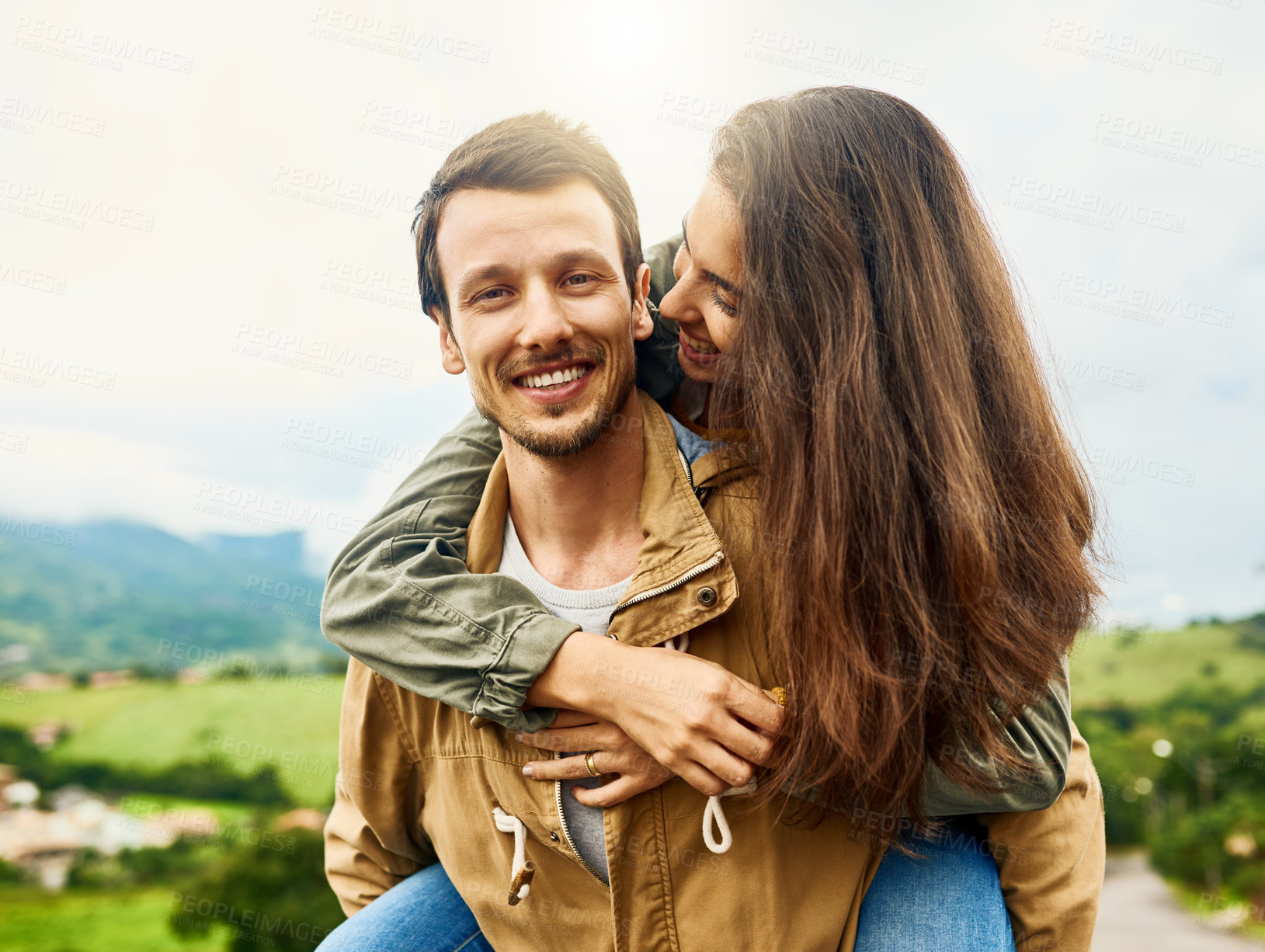Buy stock photo Relax, love and piggyback with couple in nature for happy, smile and bonding. Happiness, playful and care with portrait of man carrying woman on countryside date for spring, vacation and support 