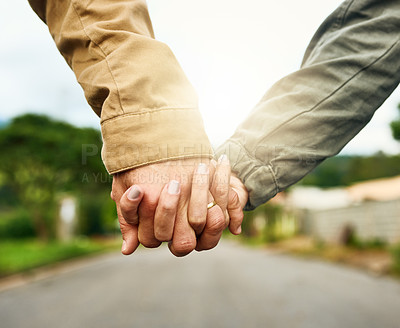 Buy stock photo Holding hands, couple closeup and bonding, partner for commitment on countryside and married people. Holiday, vacation and romantic getaway for honeymoon, outdoor or travel for love or walk in Greece