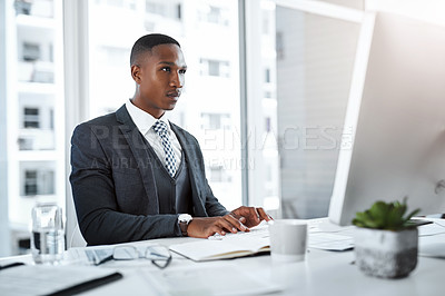 Buy stock photo Lawyer, black man and computer on desk, legal documents and keyboard for contract or deal agreement. Attorney, technology and notebook for thinking, law firm and planning with website and case report