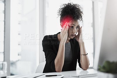 Buy stock photo Shot of a young businesswoman experiencing stress while working at her desk in a modern office