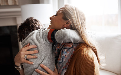 Buy stock photo Mother, sofa and boy child with hug, love and comfort in happy care in home living room. Happy family together, couch and kid with mama, embrace and smile for support, bonding and happiness in Madrid