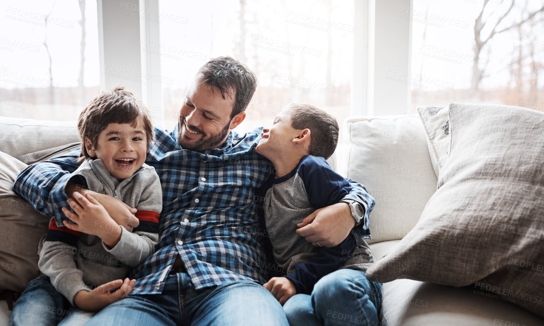Buy stock photo Hug, happy and portrait of father with children on the sofa for love, care and relax in family home. Smile, funny and dad with boy kids for quality time, affection and comedy on the couch of a house