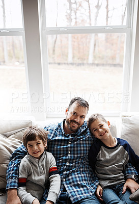 Buy stock photo Portrait of two adorable little boys having fun with their father at home