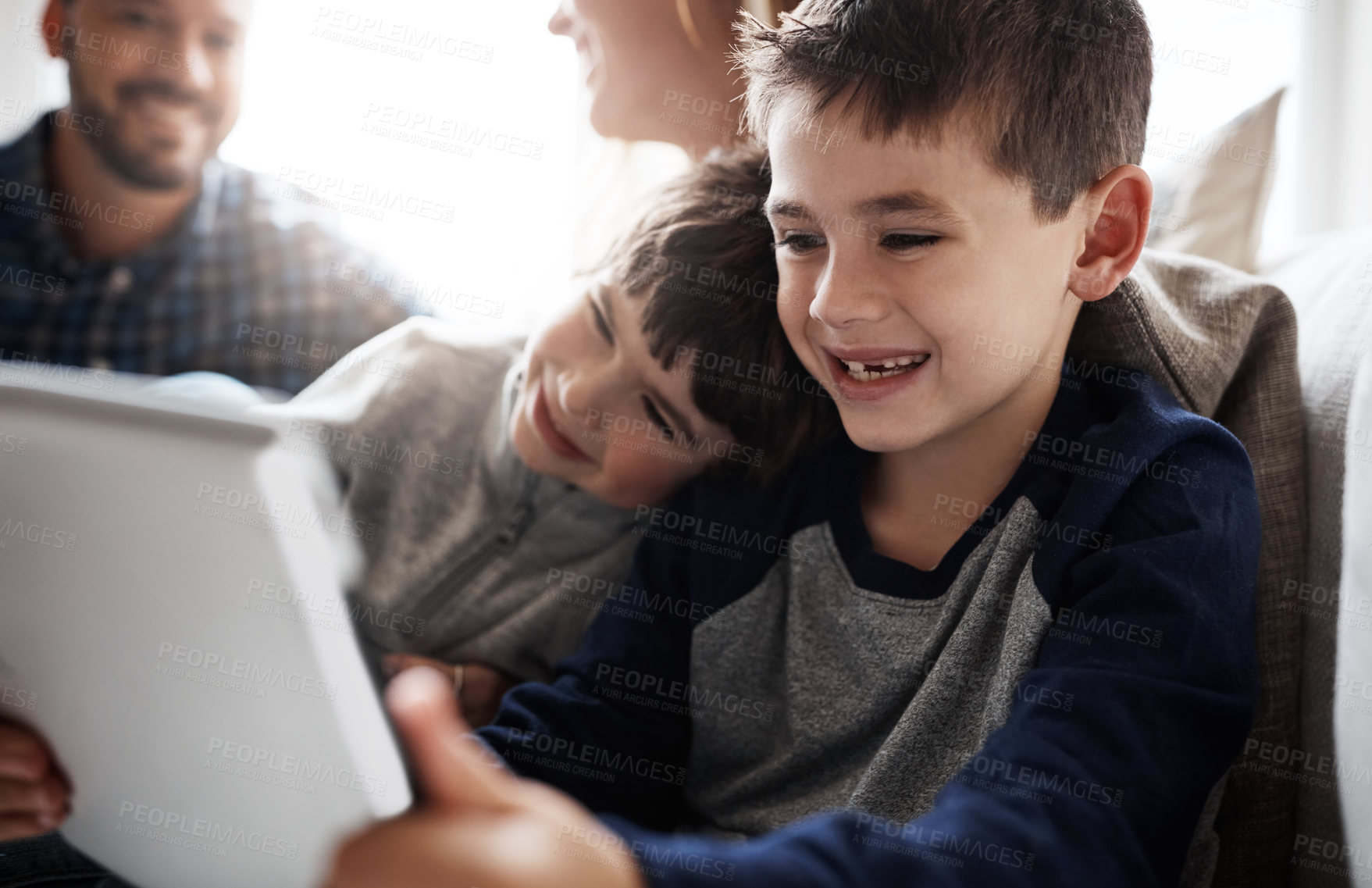 Buy stock photo Laughing kids, bonding or tablet for movies streaming, esports or social media on house or family home living room. Smile, happy or fun brother on digital technology, children learning or team gaming
