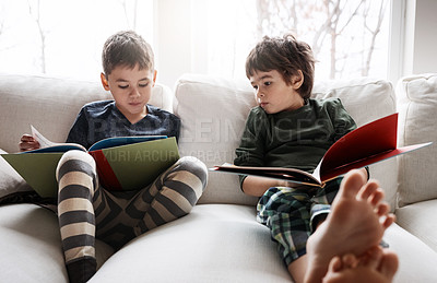 Buy stock photo Children, boys and reading books for education, learning or relax studying on house living room or home sofa. Kids, storytelling and fantasy fairytale novel in hobby activity or creative inspiration