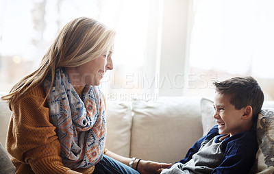 Buy stock photo Love, mother and son on sofa, playing and bonding on weekend, loving and relax in living room. Mama, boy and male child connecting, playful and smile on break, motherhood and kid on couch in lounge