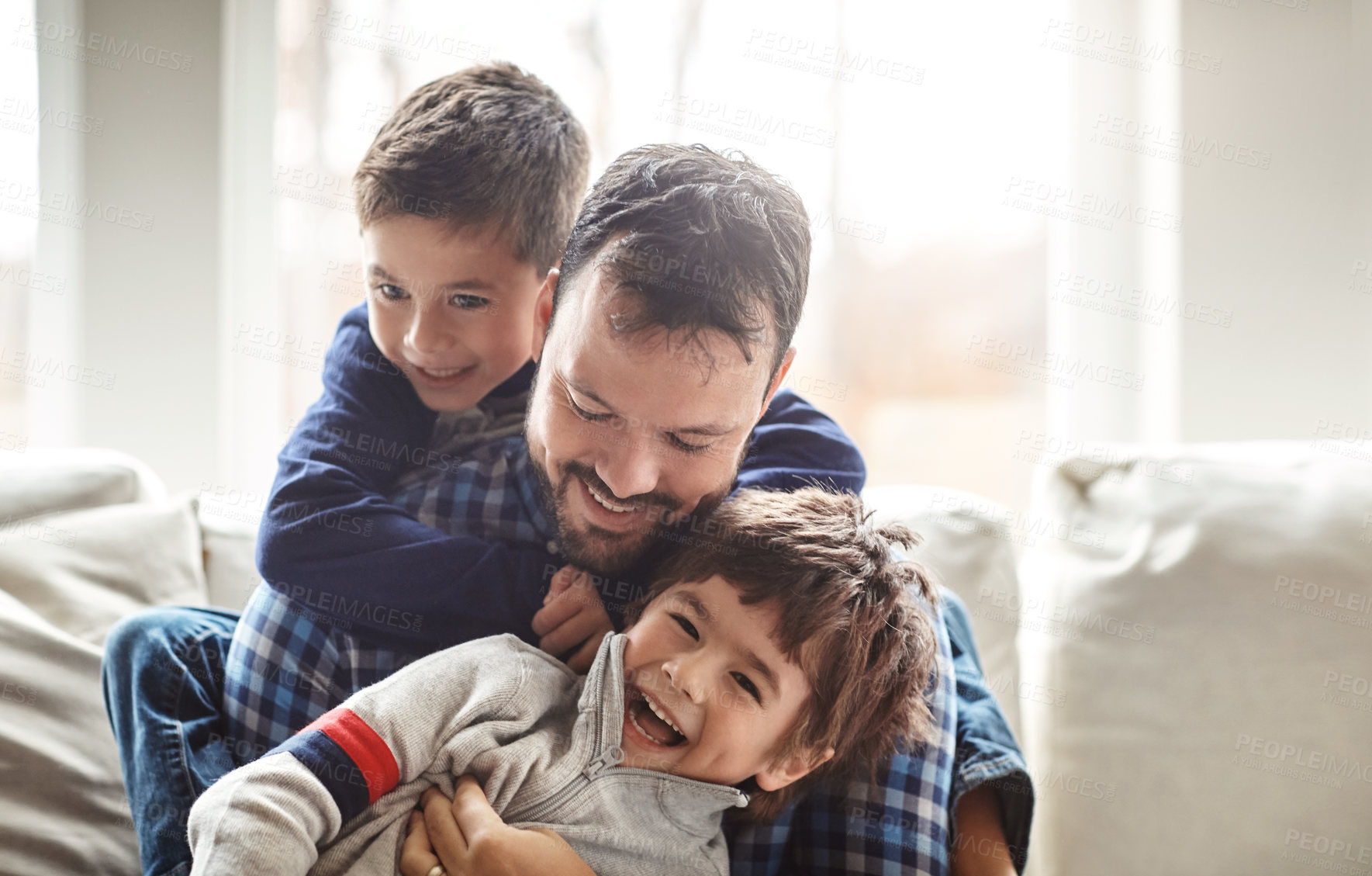 Buy stock photo Portrait of two adorable little boys having fun with their father at home