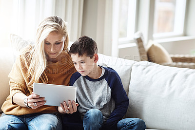 Buy stock photo Tablet, love and mother with boy on sofa bonding, quality time and relax on weekend together. Family home, lifestyle and mom and kid with digital tech for online games, social media and internet app