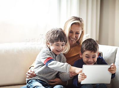 Buy stock photo Family, tablet and mother with children on sofa bonding, quality time and relax on weekend together. Love, family home and mom and kids with digital tech for online games, learning and internet app